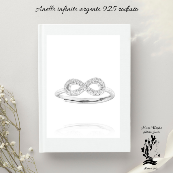 Anello infinito con zirconi bianchi – regolabile – rodiato  / Infinity ring with white zirconia – adjustable – rhodium plated